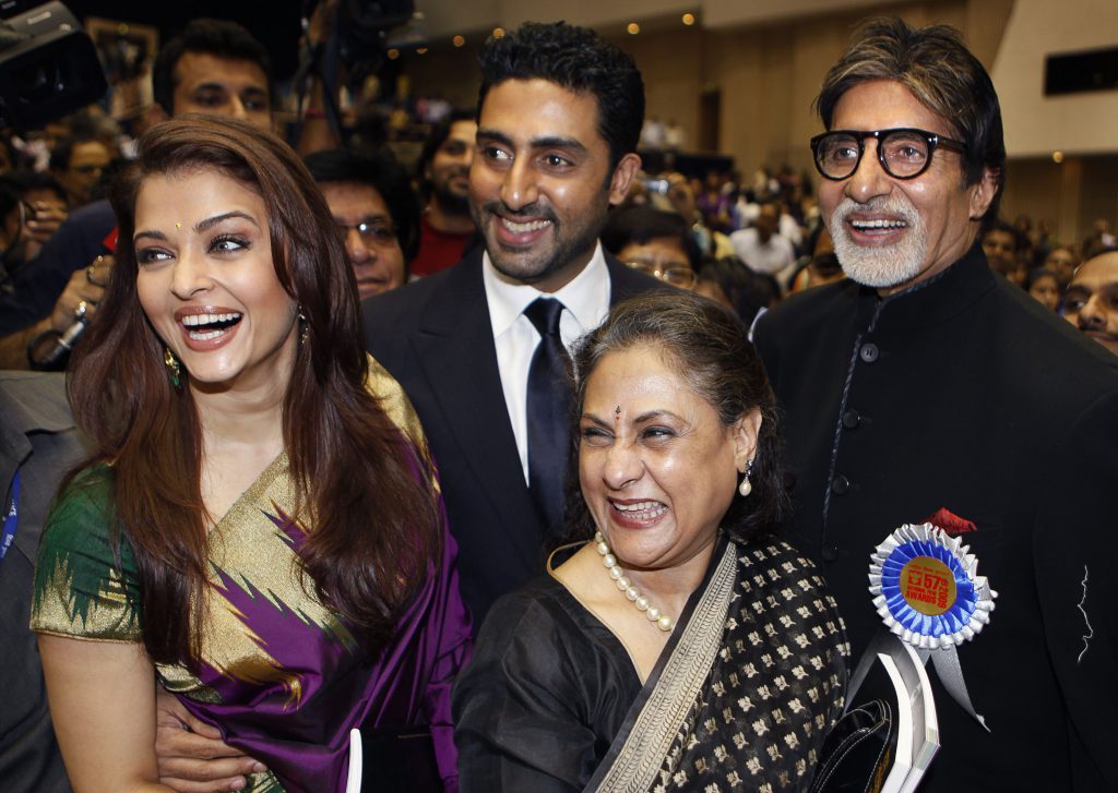Bollywood actor Amitabh Bachchan, right, poses with his family members, from left, daughter-in-law Aishwarya Rai Bachchan, son Abhishek Bachchan and wife Jaya Bachchan, after receiving the award for the best actor during the 57th National Film Award ceremony, in New Delhi, India, Friday, Oct. 22, 2010. Bachchan received the award for his role in the film 'Paa'. (AP Photo/Manish Swarup) India National Film Awards