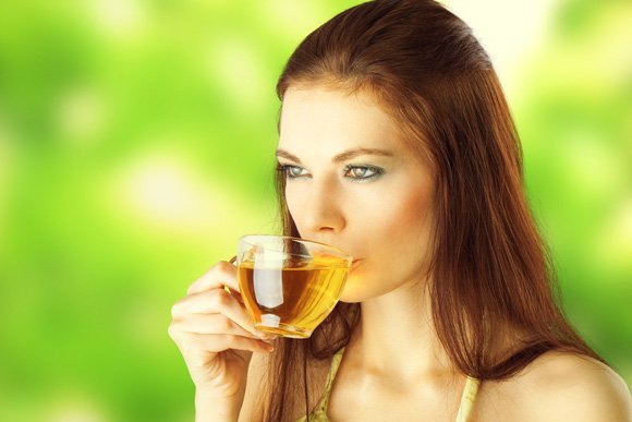 young-female-drinking-green-tea