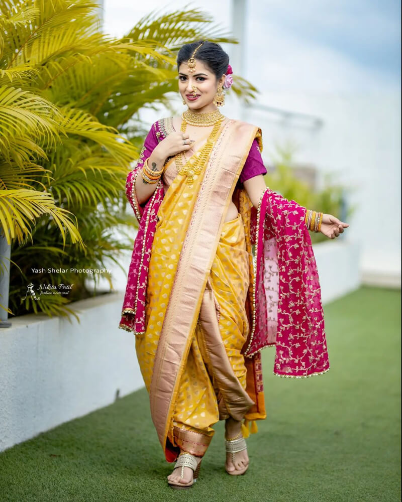 yellow and purple combo looks great marathi bridal nauvari saree designs
