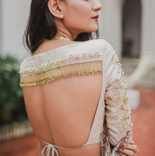 Tassel Detailing In The Backside Of banarasi saree Blouse designs